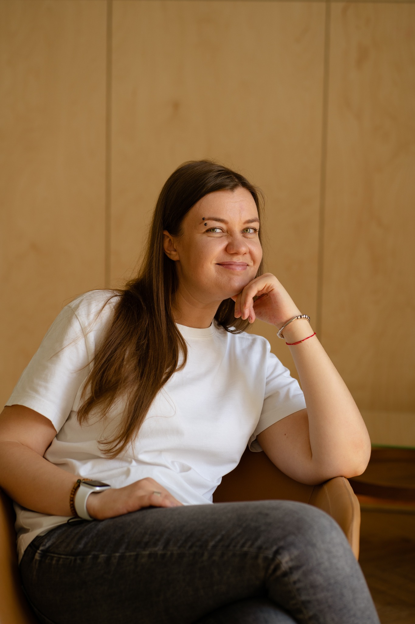Anna, your Russian teacher, smiling in her studio